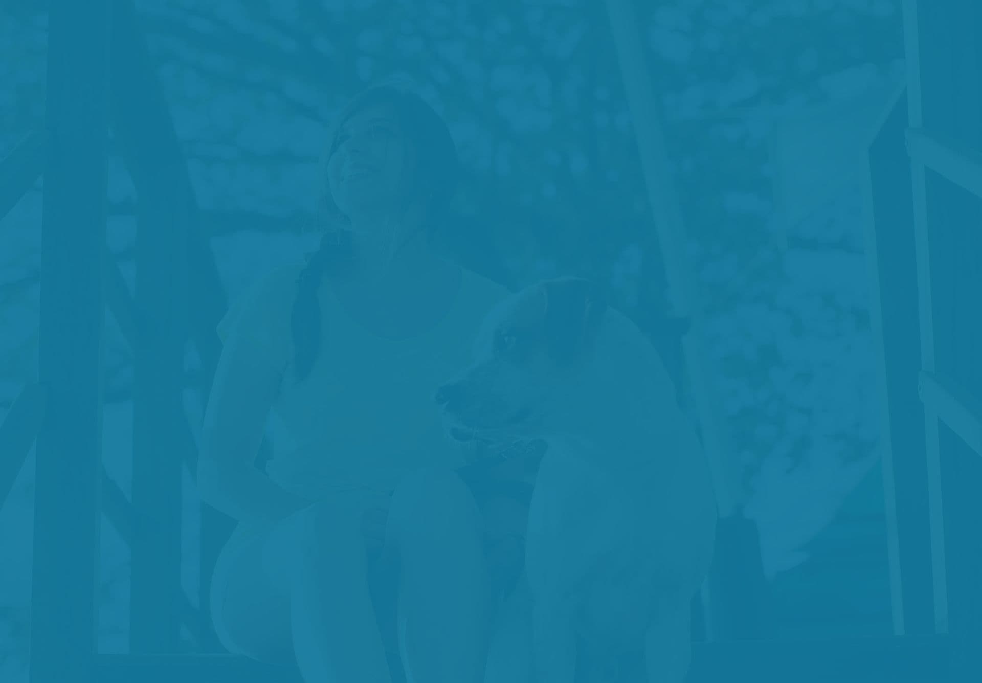 Girl with dog with a blue overlay